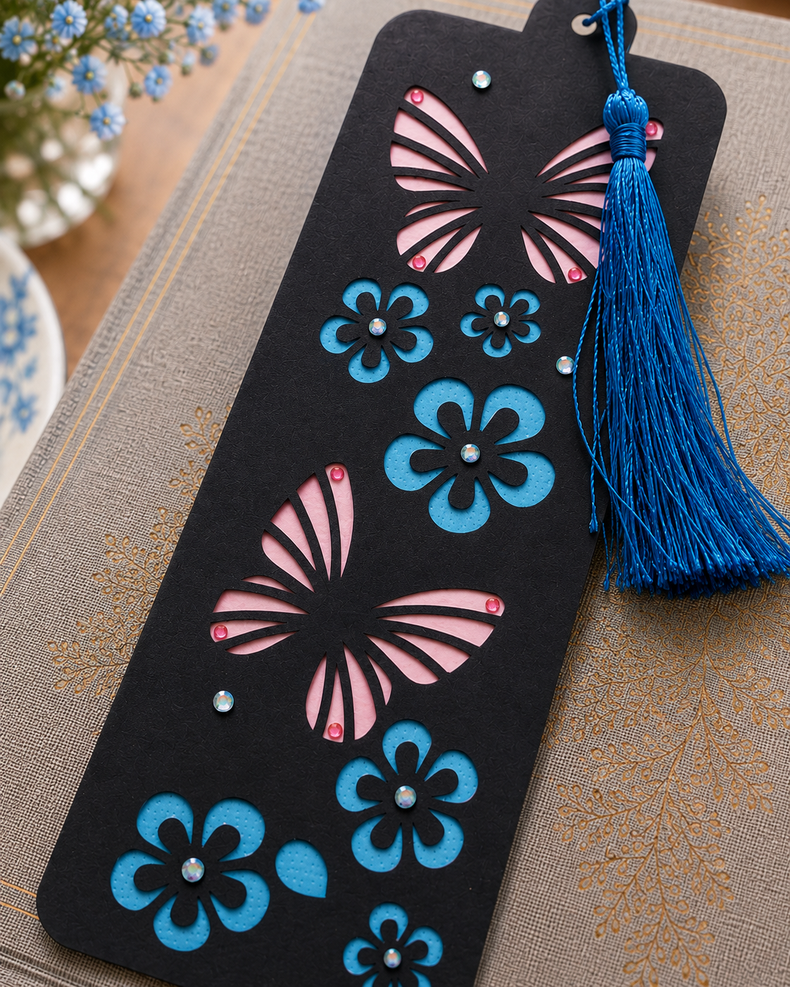 Handmade Butterfly & Floral Bookmark with Blue Tassel Handmade Butterfly & Floral Bookmark with Blue Tassel
