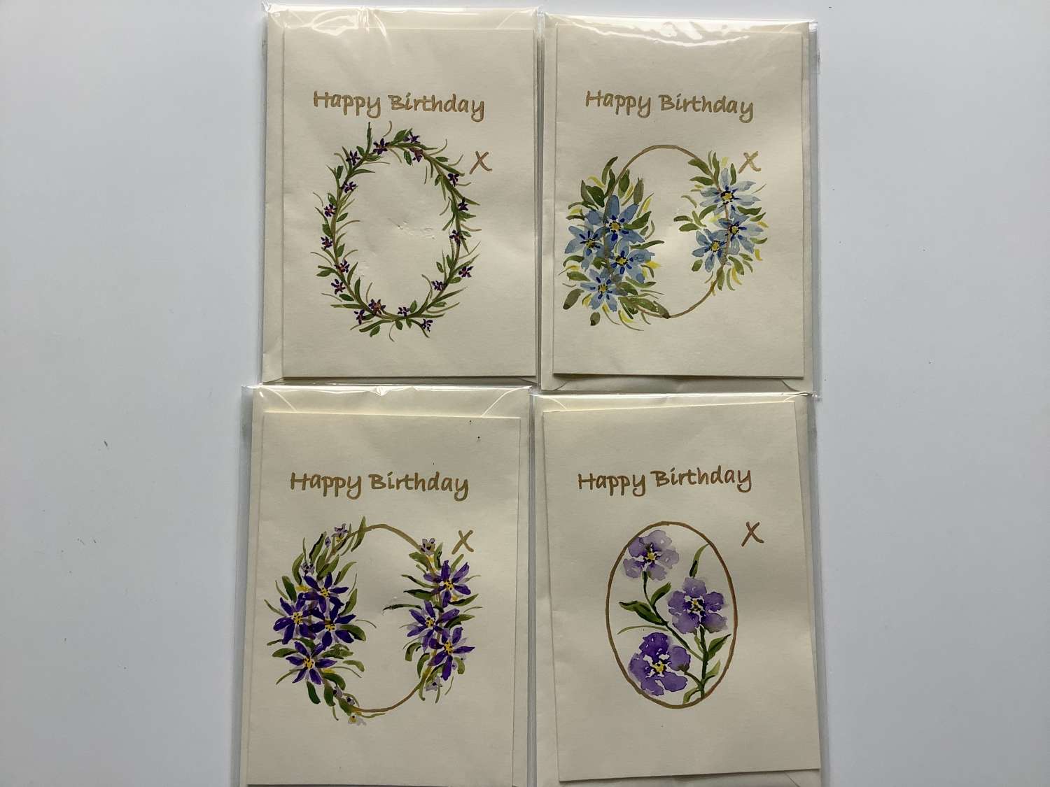 4 x Birthday cards and envelopes. Hand painted with floral design 4 x Birthday cards and envelopes. Hand painted with floral design