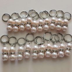 20 pale pink stitch markers