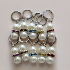 10 white stitch markers