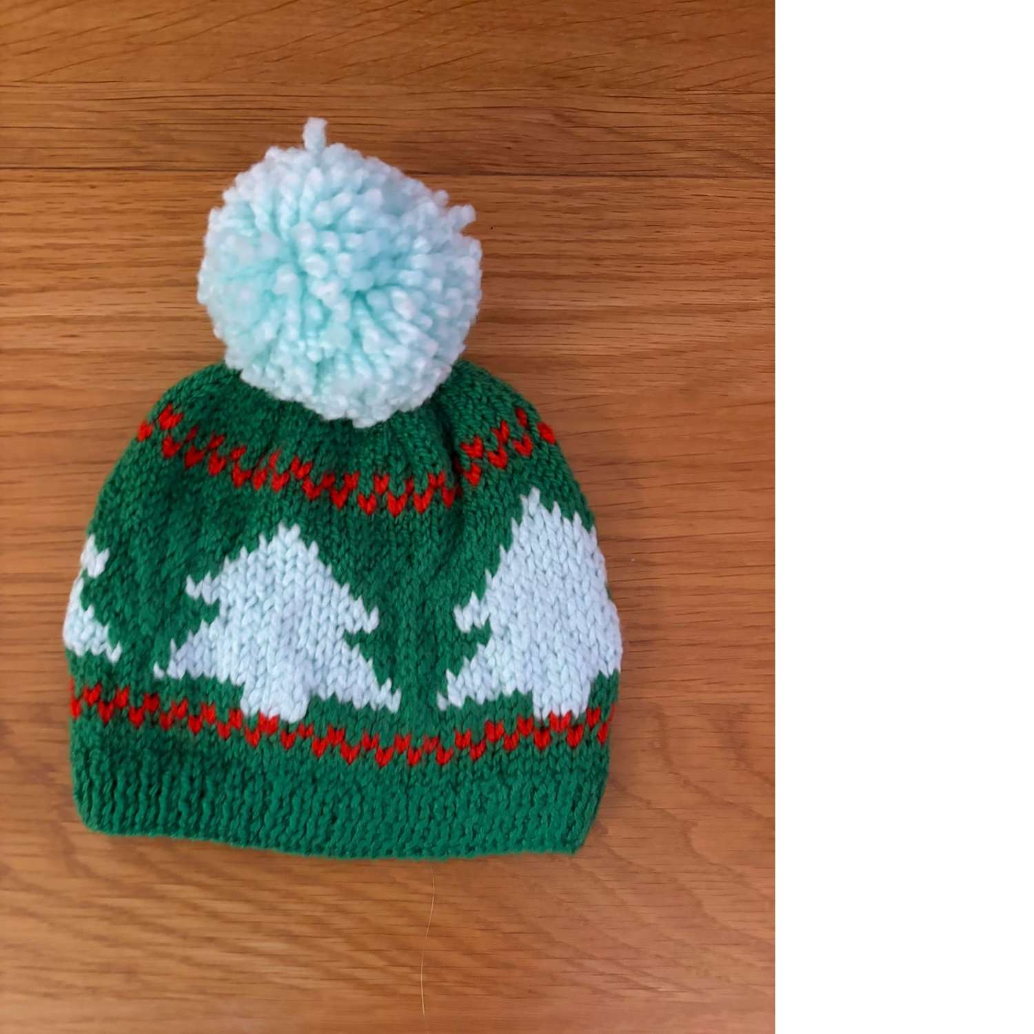 Hand-knitted baby's bobble hat Hand-knitted baby's bobble hat