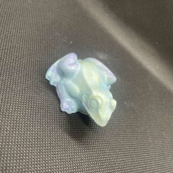 Handmade blue and purple plaster toad