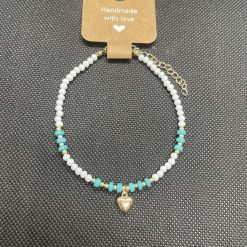 Handmade green and white bracelet with heart charms