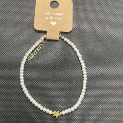 Handmade white beaded bracelet with star charm