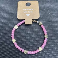 Handmade pink wired bracelet with gold heart charms