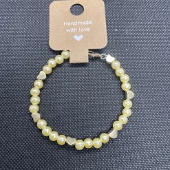 Handmade gold bracelet with gold heart charms