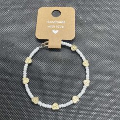 Handmade white wired bracelet with gold white charms