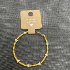 Handmade gold wired bracelet with gold star charms