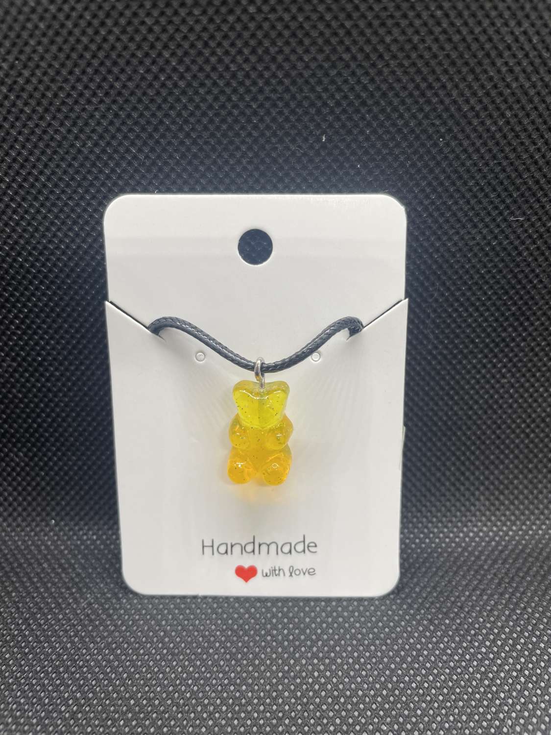 Handmade yellow and orange gummy bear pendant necklace Handmade yellow and orange gummy bear pendant necklace