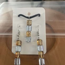 Handmade blue and orange necklace and earring set.