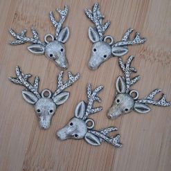Tibetan silver stag head charms