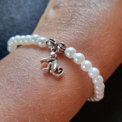 Faux pearl monkey bracelet