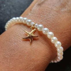 Faux pearl starfish bracelet