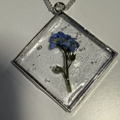 Forget me not with stalk clear resin pendant on 925 sterling silver chain