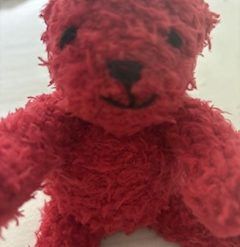 Hand knitted little teddy