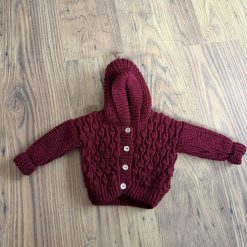 Hand knitted baby cardigan with hood