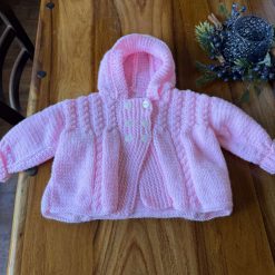 Hand knitted baby cardigan