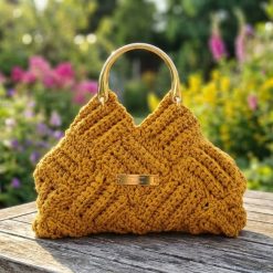 Yellow crochet handbag with gold handles