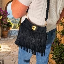 Black shoulder bag with fringe