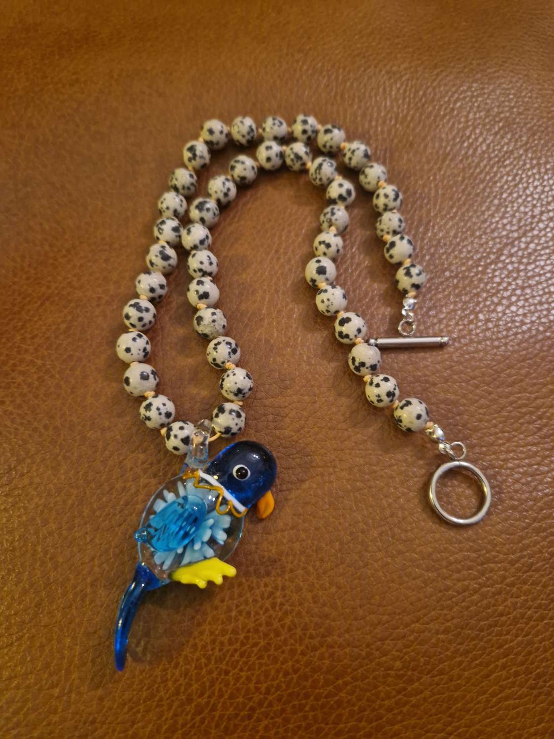 Handmade Dalmation Jasper beaded necklace with Lampwork Glass Parrot Pendant Handmade Dalmation Jasper beaded necklace with Lampwork Glass Parrot Pendant