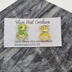 big yellow and green bear studs