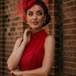 Poppy red pillbox on band with veiling detail