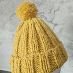 Child’s hand knitted Hat with pom-pom 0-3 months