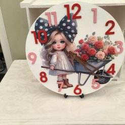 Decoupaged MDF clock using a Cheshire Cat image