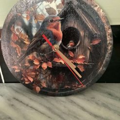 Decoupaged MDF clock using a Cheshire Cat image