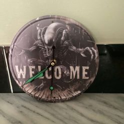 Decoupaged MDF clock using a Cheshire Cat image