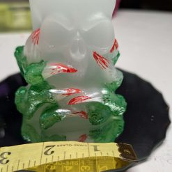 Skull with claws ornament