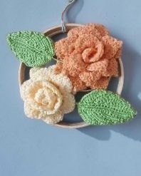 rose arrangement on bamboo hoop