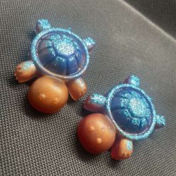 X2 blue glitter and bronze turtles