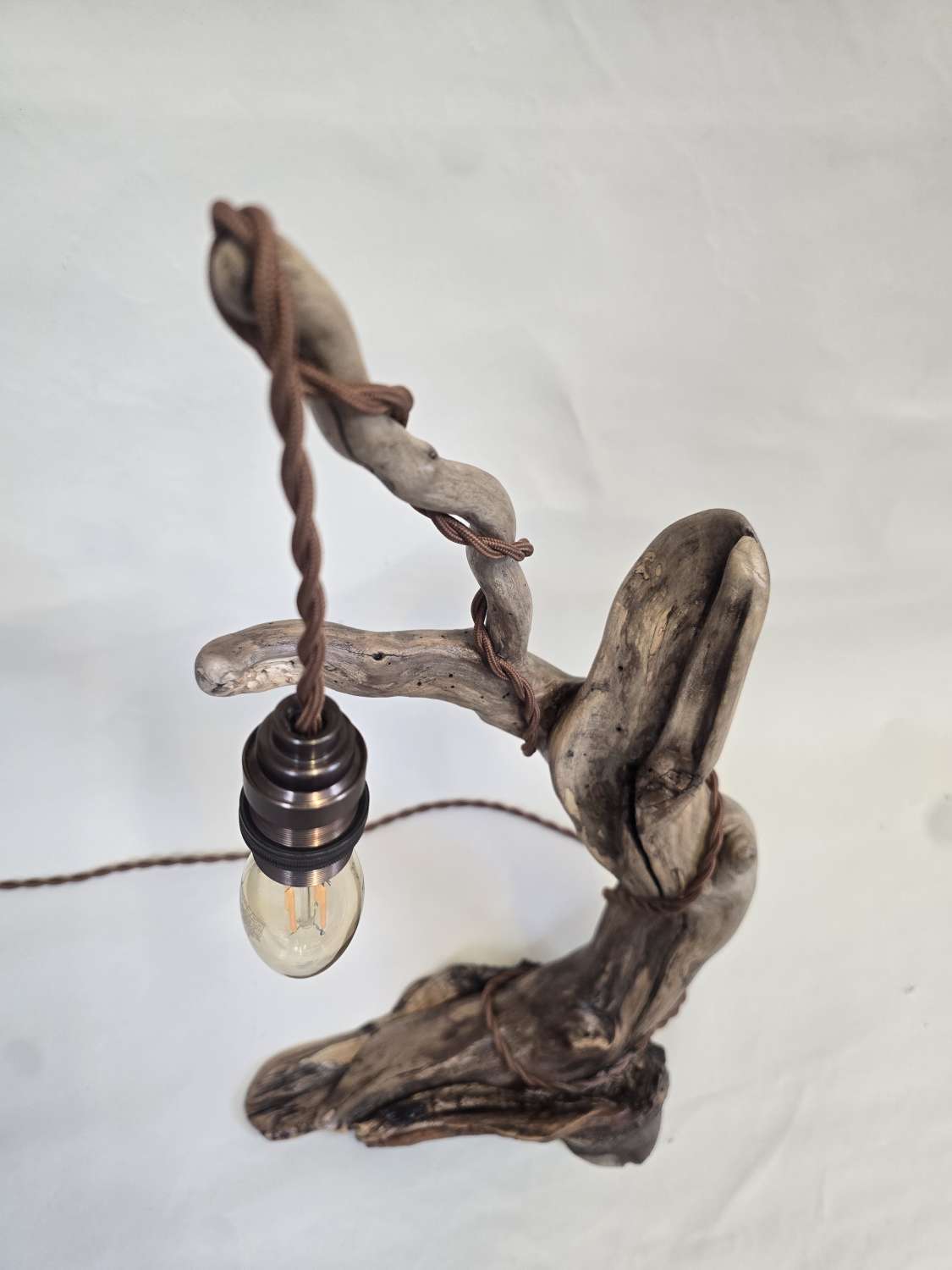 Rustic flowing wooden bedside lamp Rustic flowing wooden bedside lamp