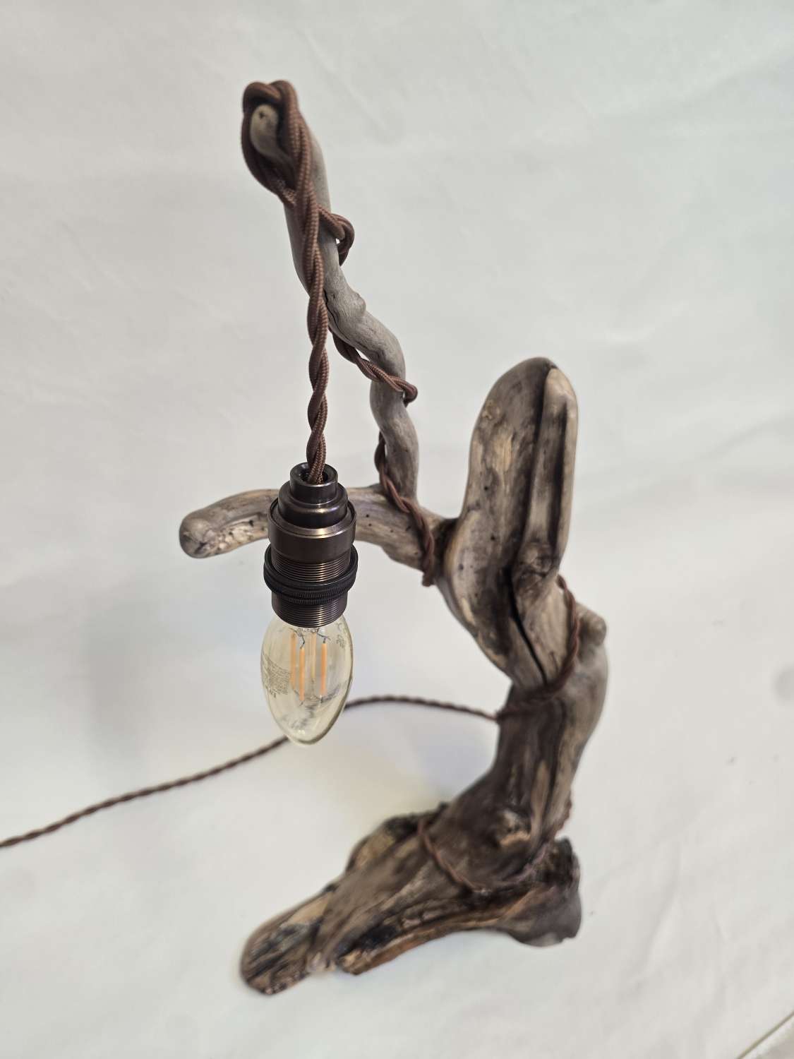 Rustic flowing wooden bedside lamp Rustic flowing wooden bedside lamp
