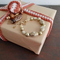 handmade beaded bracelet in cream and gold