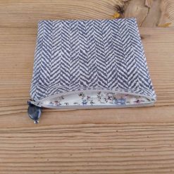 Makeup bag handmade in patterned blue fabric with zipper closure