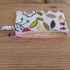 make up bag in a bright floral print with a zipper closure.