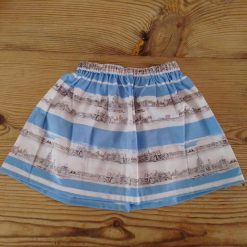 Baby skirt made from a blue lined cityscape pattern. 12-18 months