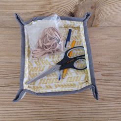 Fabric storage trays for use in the office, bathroom and bedroom.