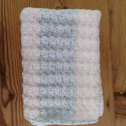 Baby and toddler blanket in white and ice blue colourway.
