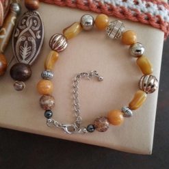 handmade beaded bracelet in a tan colour